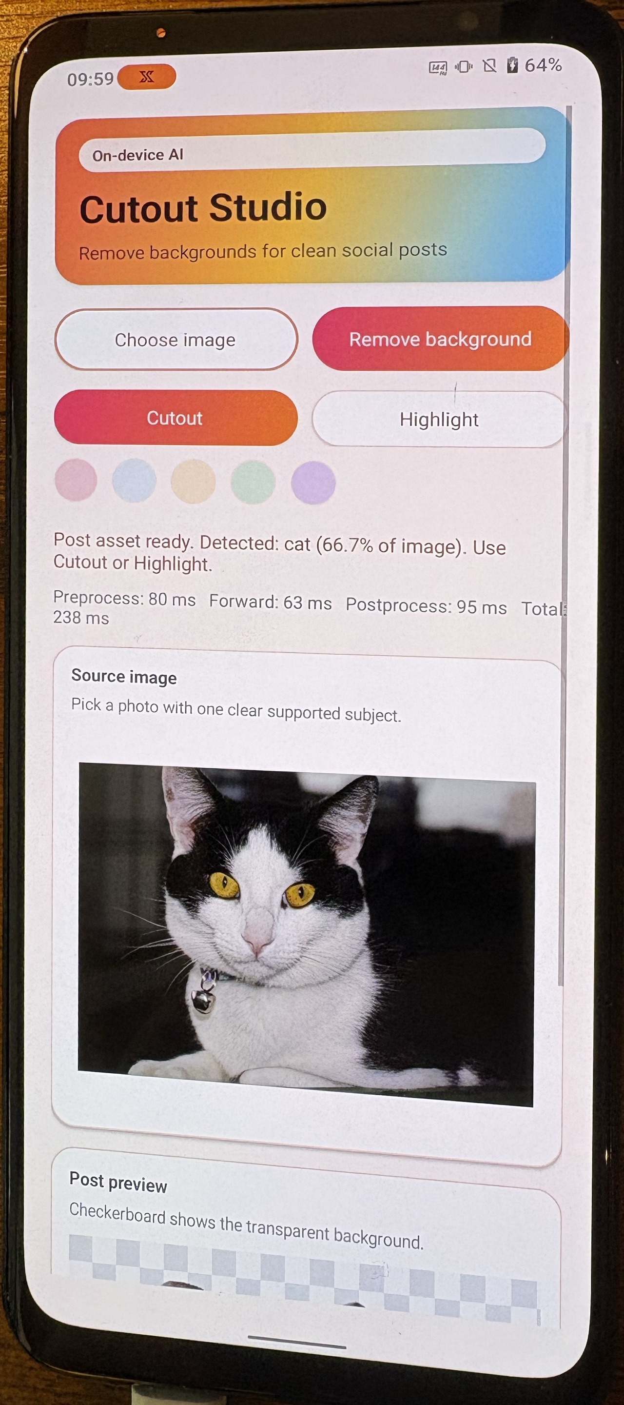 Image Alt Text:Cutout Studio processing a cat image on a physical Android phone.